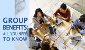 Office Workers talking about group benefits article image by GroupEnroll